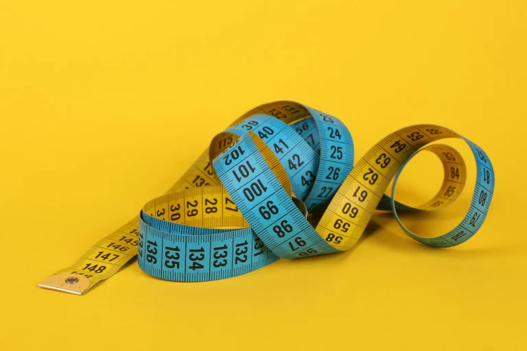 Shop Owner Measuring Tape
